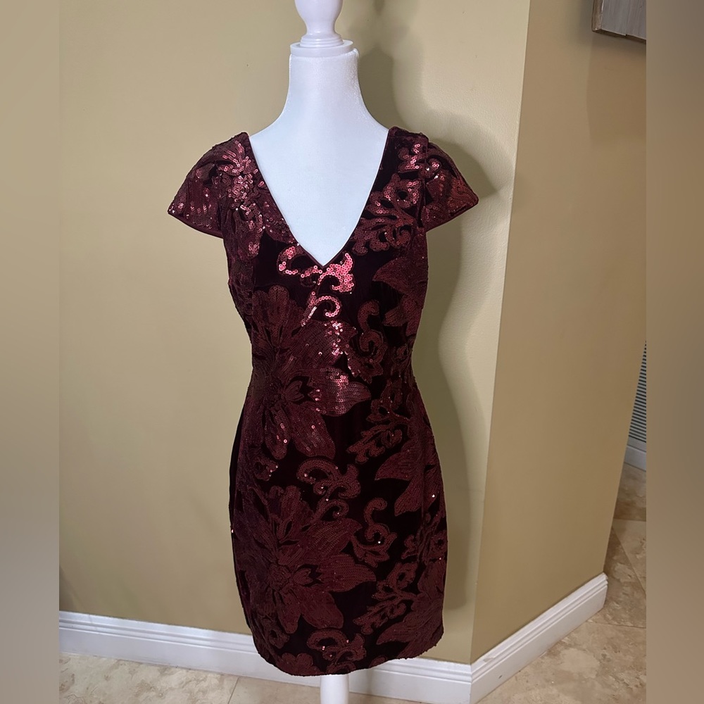 Guess Burgandy sequin dress that is figure flattering.